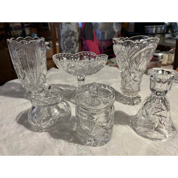  vintage pinwheel, crystal sugar, bowl, creamer, two vases, candy dish, and a candle holder