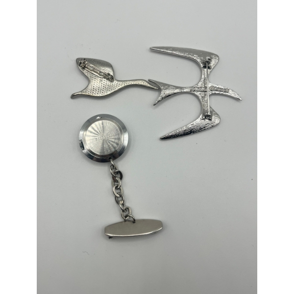 a vintage Sarah Coventry Mister Siegel Brooch from 1974, with vintage pewter brooch featuring a flyi