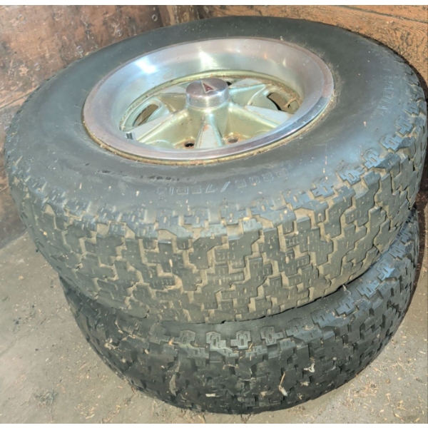 4 24' Tires - 2 Have Pontiac Center Caps 2 Do Not P205/75R14