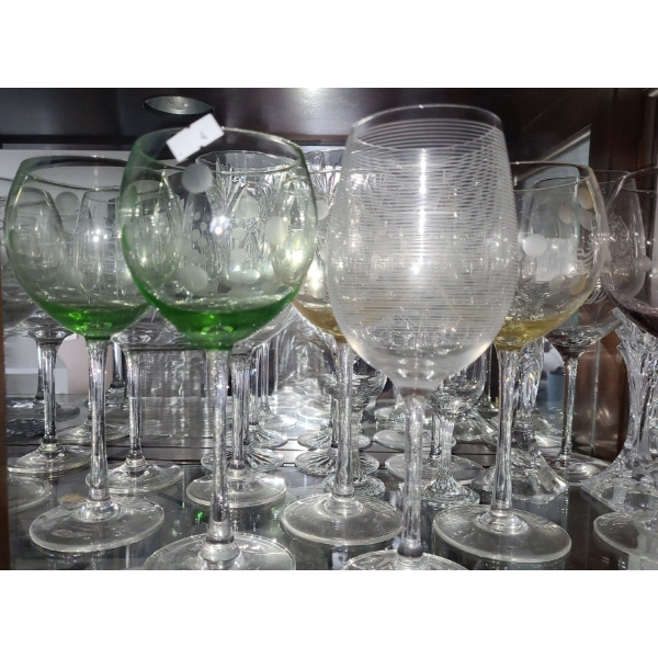 Assorted Stemware Including 2 Flutes and Several Wine Glasses