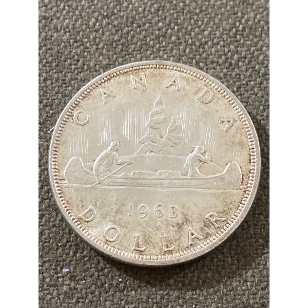 1963 Canadian Silver Dollar Coin Featuring Voyageur Design