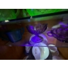 Image 1 :  collection of purple and white uranium glass on shelf five