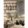 Image 5 : Wall-mounted Rack With Assorted Contents, Including Tools and Accessories