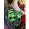 Image 5 :  huge Rubbermaid filled with red Christmas lights of poinsettias, two Christmas wreaths, some green 