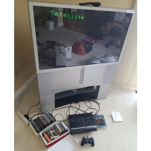 PS3 & Controller, Sony Television Model KP-46WT510, 43 w, 52 h, 25 d, Asst DVD's & Cassettes 