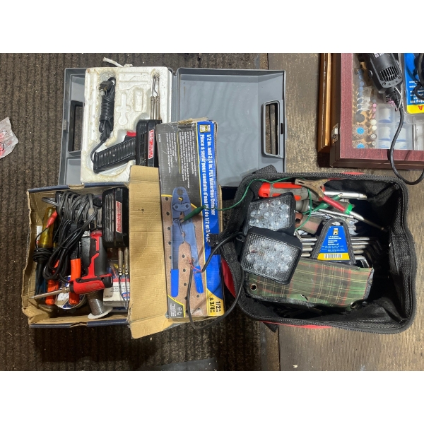 Tool Bag, full of tools, soldering guns and a whole pile of caulking guns