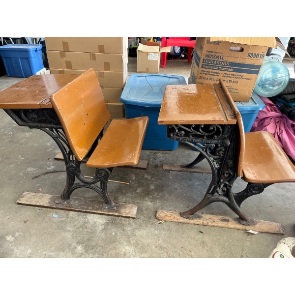 Antique School Desks Set of 2 . With Cast iron bases and wood top and seating surface
