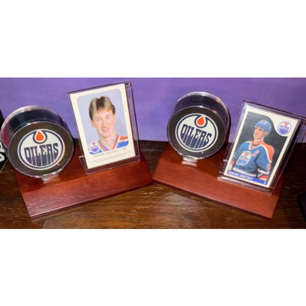 Two Regulation Sized Collectible Edm Oilers Hockey Pucks Mounted  w/Two Cards on Stand