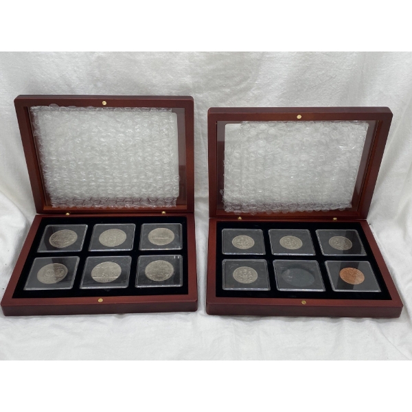 Canadian $1.00 and $0.50 Coins in Display case