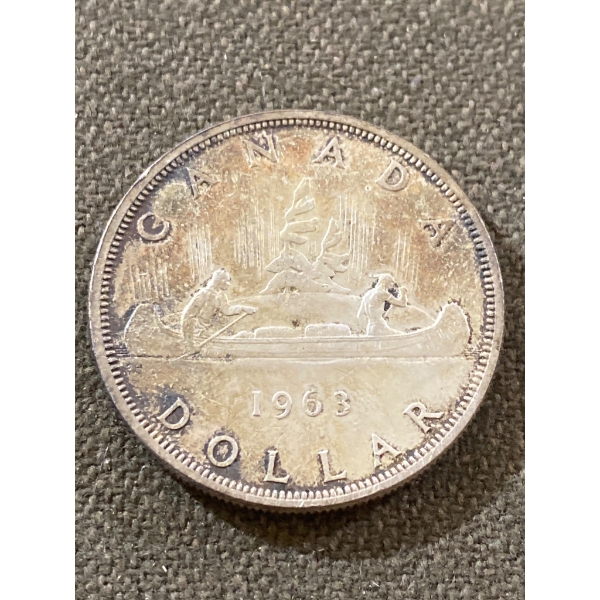 1963 Canadian Silver Dollar Featuring Canoe Design