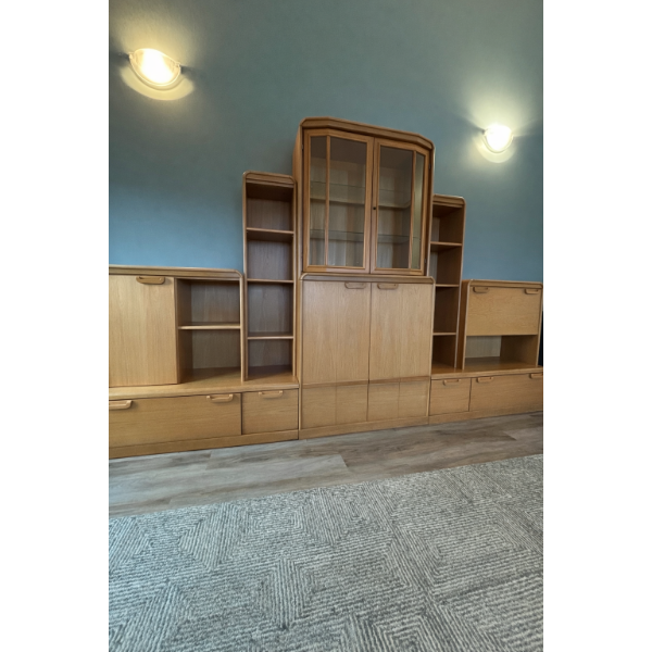 Vintage 1970s teak shelving unit comes in three pieces with easy roll shelving and tons of storage s