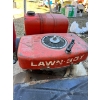 Image 2 : Lawn Boy lawnmower, gas jug, and homemade manual chainsaw. A true handyman special. 


