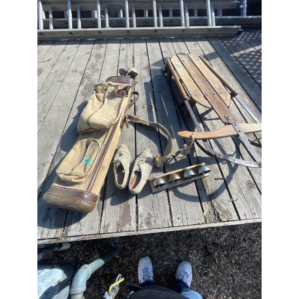 Antique Sporting Goods Collection. Antique Tobaggan, Antique Golf Clubs, Shoes and Sleighbells.