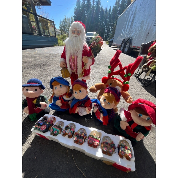collection of Christmas decorations with battery operated Christmas carollers and small set of snow 