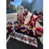 Image 1 : collection of Christmas decorations with battery operated Christmas carollers and small set of snow 