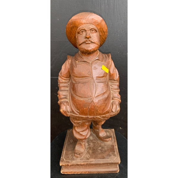 Wooden Sculpture of a Man 