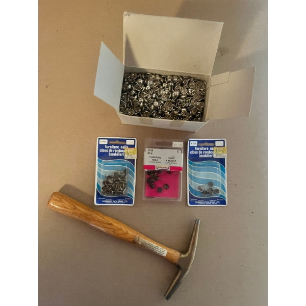 

Furniture tack hammer, and assortment of furniture nails. 

