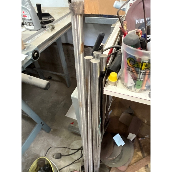 1 inch stainless steel rods eight in total 38 inches long.