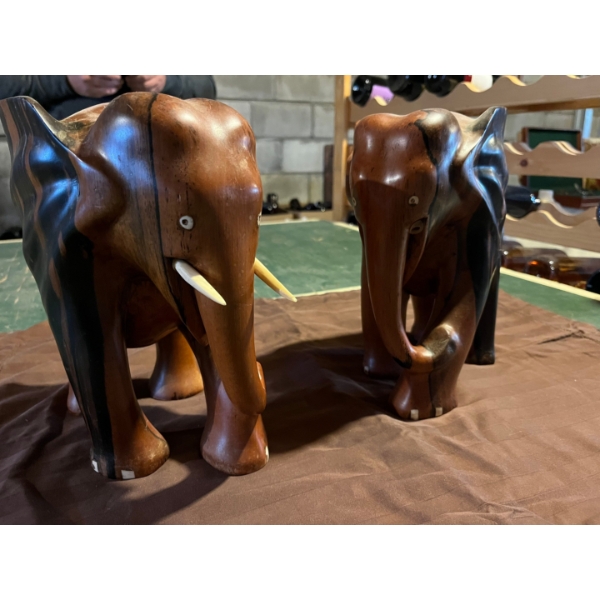 handcrafted elephants from Africa from beautiful African wood one with tusks and one without tusks
