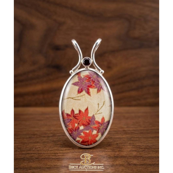 Sterling Silver Pendant With Fabric Inlay and Garnet Accent