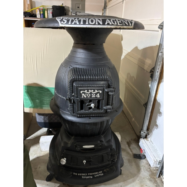 Antique Gurney Foundry Co. No. 24 potbelly stove, cast-iron stove known for its distinctive shape an