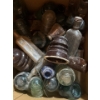 Image 1 : box full of un research medicine bottles, and a variety of insulators 
