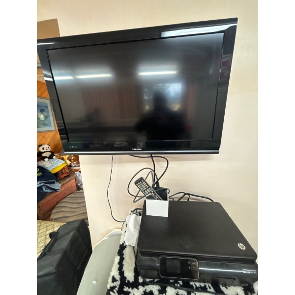 Toshiba television with a HP printer, including a Apple TV