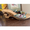 Image 2 : Collection of cool items, including a handmade pair of wooden shoes with hand beads done on them Chi