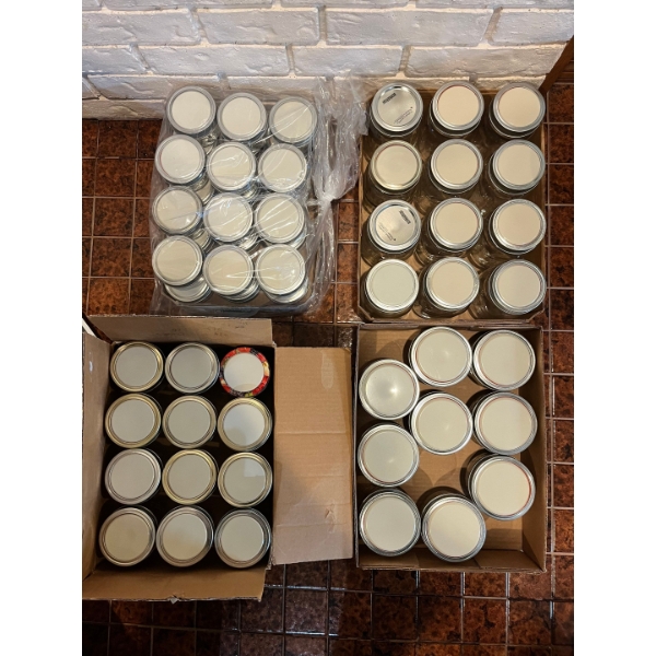 Canning jars cleaned and with New lids. 2 flats of new 1/2cup 12x 1 cup 9x widemouth 1 cup & 12X2cup