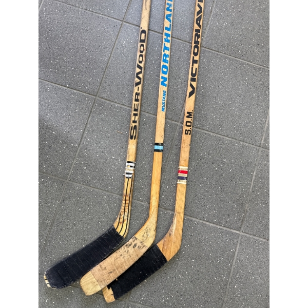 Three Vintage Wooden Hockey Sticks