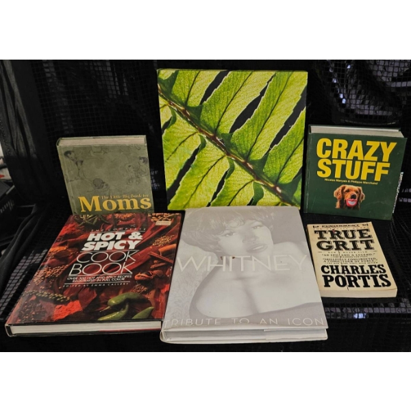 Seven Books Including 'Whitney: Tribute to an Icon' and 'True Grit' by Charles Portis