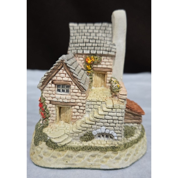 Hand Carving 'The Cobbler' By David Winter