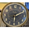 Image 12 : Decorative Clocks, Philishave Razor, and Peacock Artwork Display