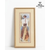 Image 2 : vintage placemats with botanical prints and a framed art print featuring a figure in vintage cricket