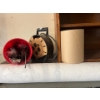 Image 5 : shelf with contents, including saws, cutoff, saws, electric drills, painting supplies, and a number 