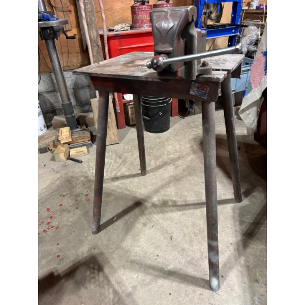 Small iron working bench with 4 inch vice made in England
21 x 17 x 35height