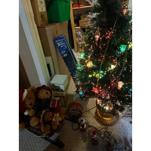 Miniature Christmas tree and Bears riding slays singing Christmas tunes and three LED lawn ornaments