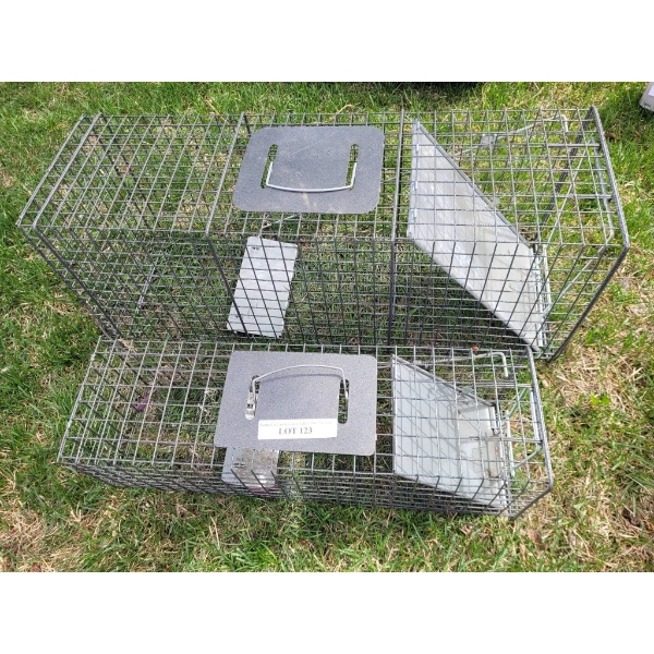 Two Metal Animal Traps, Largest 32 Inches Long