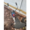 Image 10 :  carport with contents, contents include Weedwacker pressure, washer, electric motors, fertilizer, 