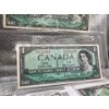 Image 13 : 12 1976 Canadian $1 Bills