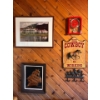 Image 2 : Collection Of Cowboy Art, Red Clock, Ship Painting And Picture Of A Resort