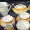 Image 4 : Yellow Striped Teaset: Teapot 6.5 W, 4 D, 4 T, Blue Teapot 3.5 T, Assorted Cups and Saucers