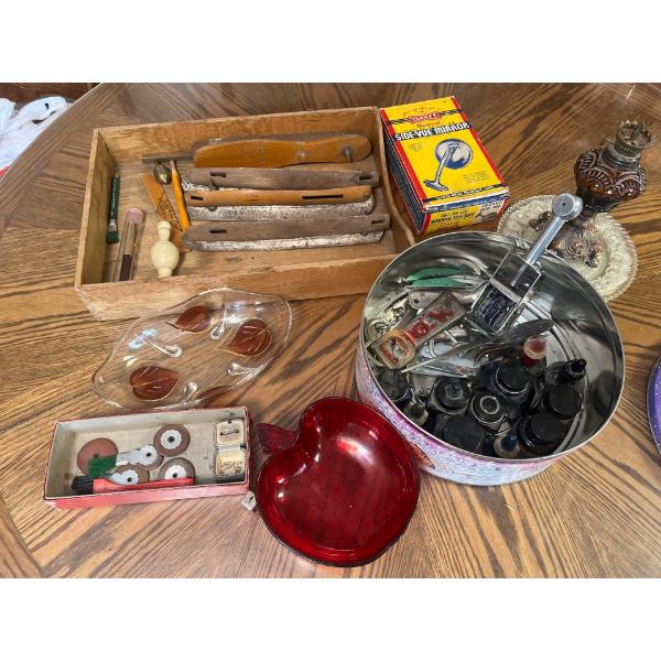 Vintage skate blades inkwells for a clicky, free pen, bottle openers, and a vintage side view mirror