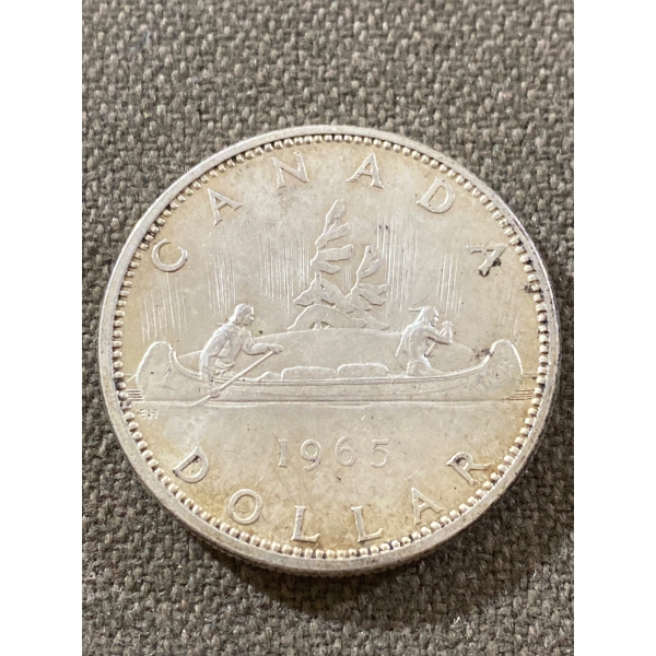 1965 Canadian Silver Dollar Coin with Canoe Design