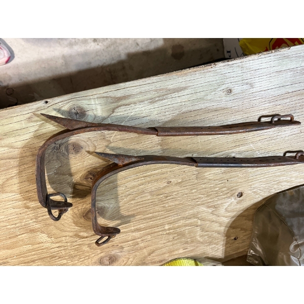 antique heavy gauge steel log climbing apparatus