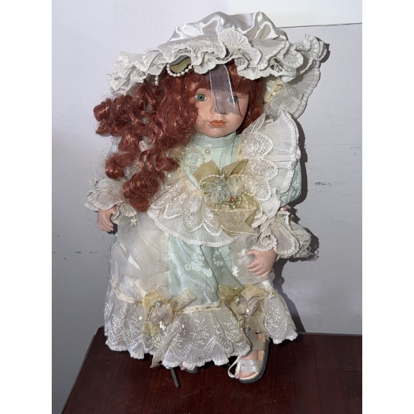 Porcelain Doll With Curly Red Hair and Bonnet
