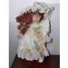 Image 1 : Porcelain Doll With Curly Red Hair and Bonnet