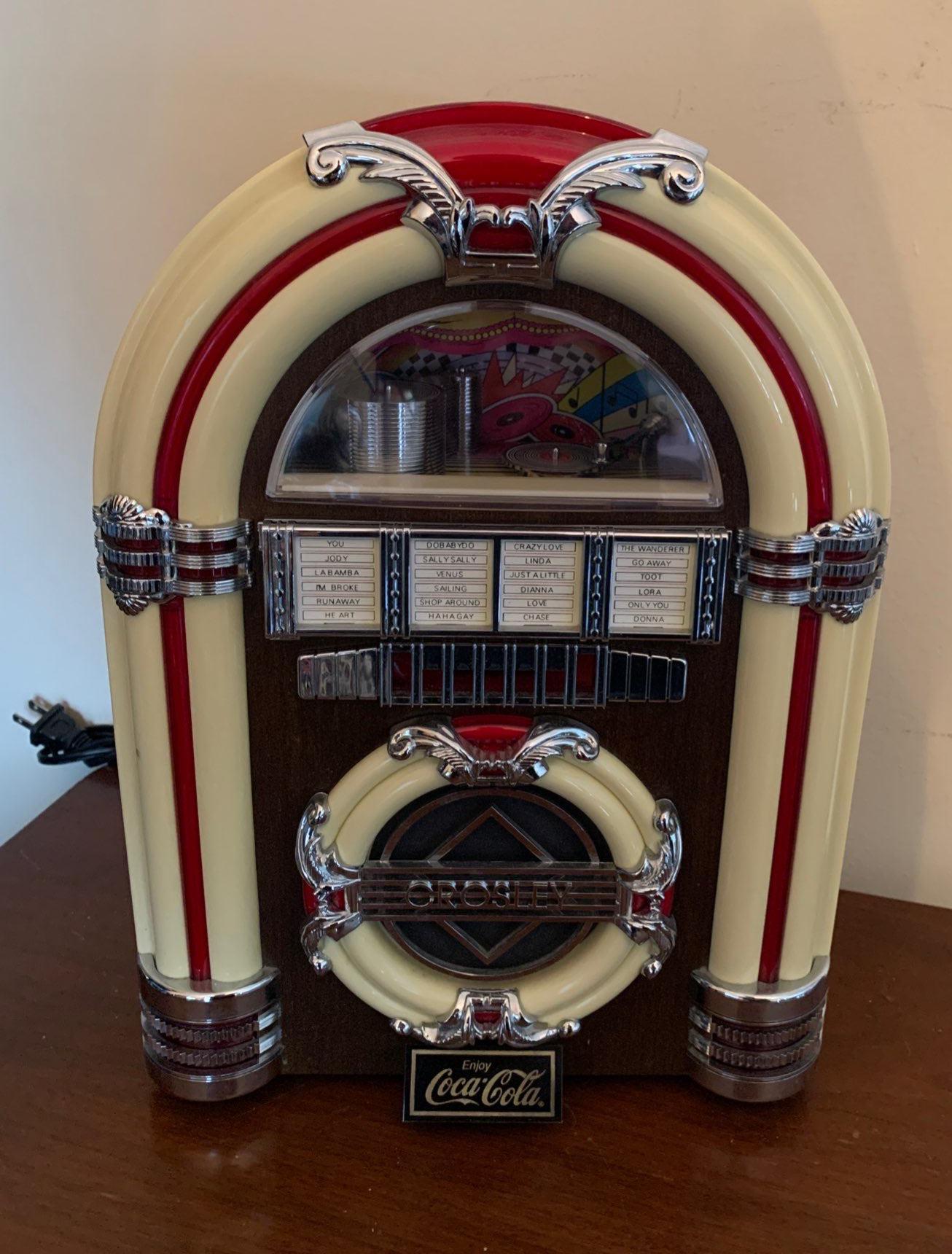 Crosley Enjoy Coca Cola Mini Jukebox Radio CR-11 - Beck Auctions Inc.