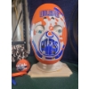 Image 5 : Handmade Oilers Blanket, Steel Sign, Oilers Mask, Toy Bike that Makes Noise