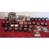 Various Oilers Pucks, Oilers Grinder Puck and Storage Pucks